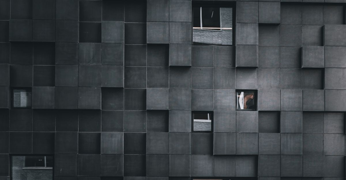 A dark geometric grid of nine nodes, the nine attributes of a complete human laid out as a measurable system