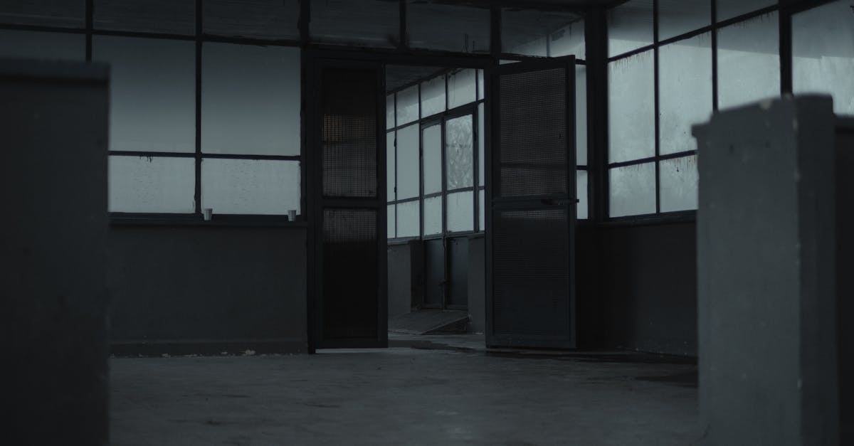 A spare, silent dark room with a single point of light, the clarity of a quiet mind